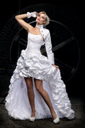 White corset gown featuring embroidered Victorian details, alternative bride fashion and romantic bridal wear aesthetic