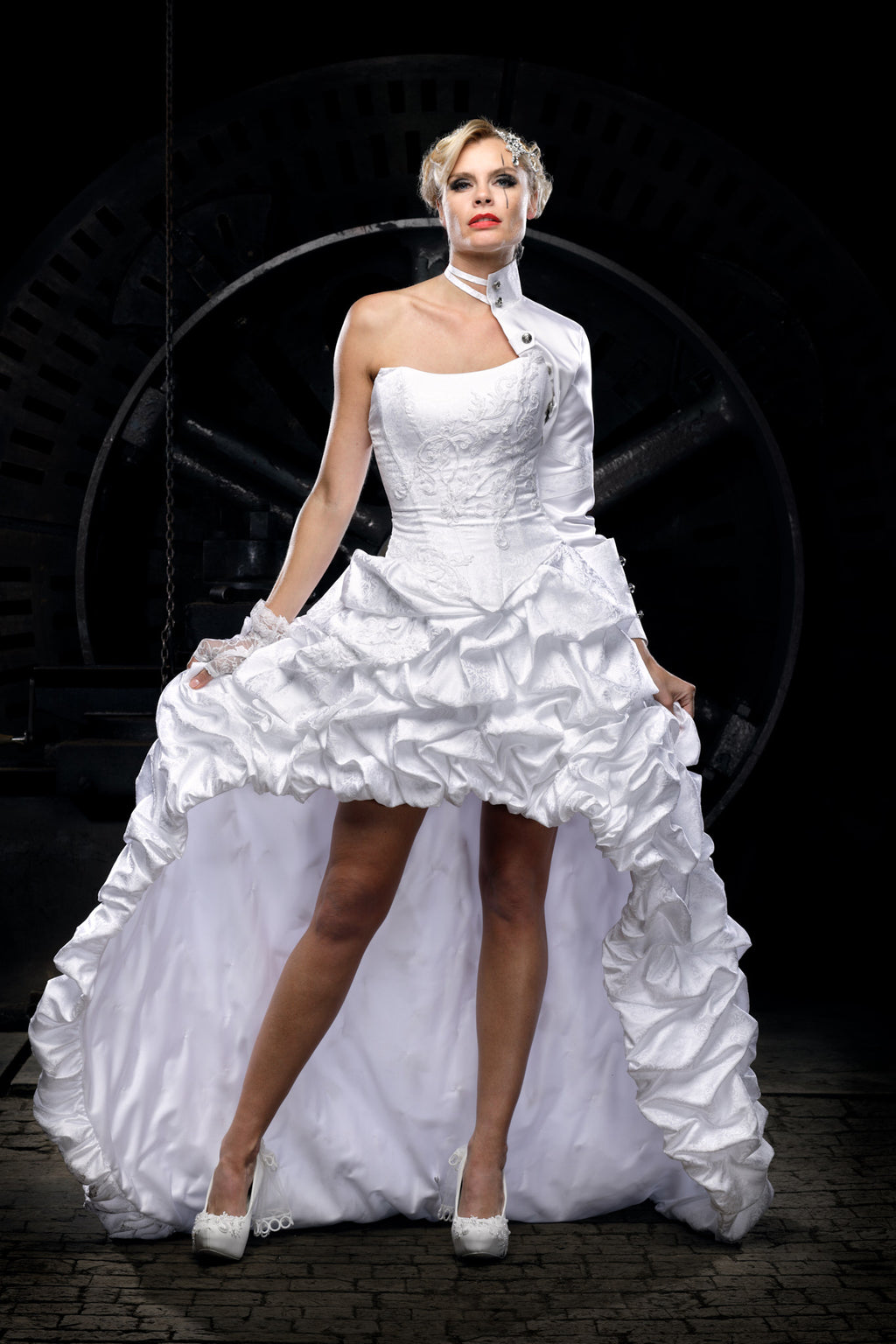 Detailed view of a white Victorian wedding dress with structured corset bodice and unique alternative bride design