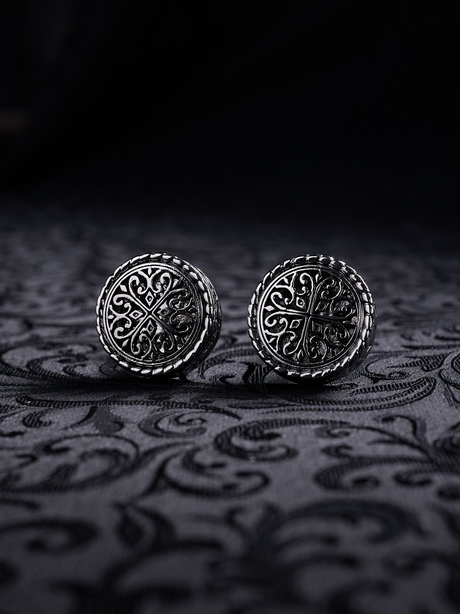 Baroque Crest cufflinks styled on a black dress shirt cuff for a complete dark couture wedding look