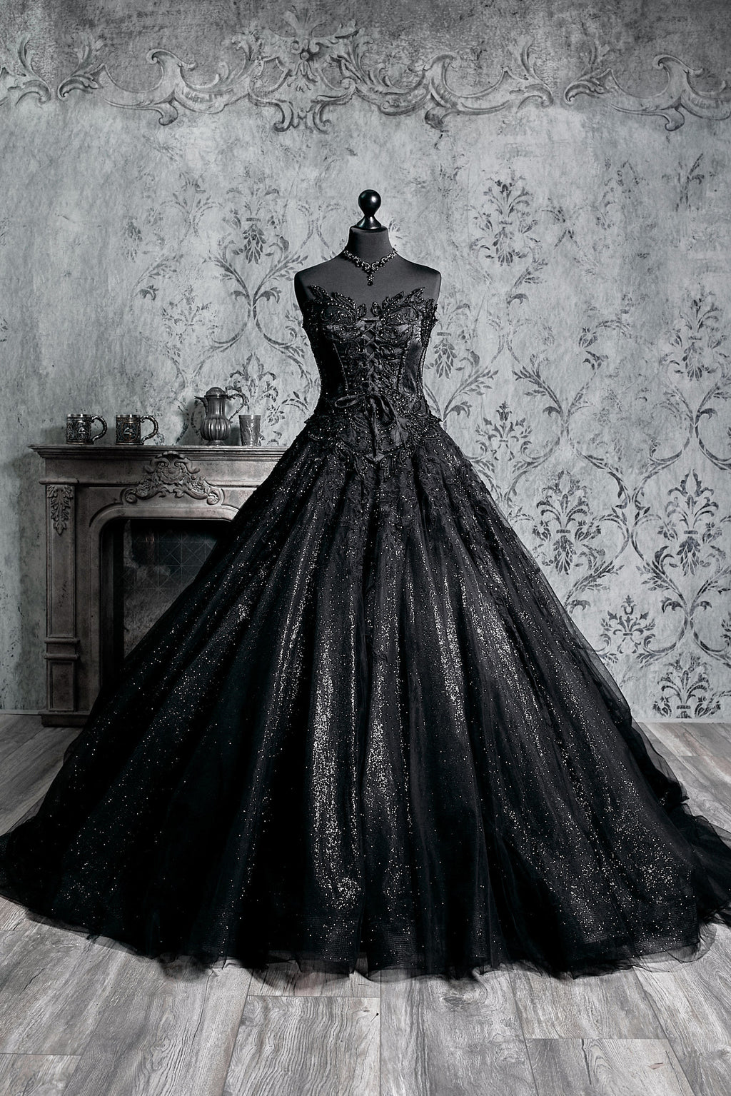Black gothic wedding dress with strapless sweetheart corset, heavily embroidered lace bodice and voluminous glitter tulle ballgown skirt
